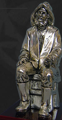 Pescador en plata